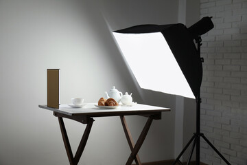 Shooting food in photo studio with professional lighting equipment