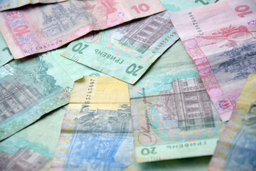 Processed collage of Ukrainian Hryvnia UAH bills banknotes texture. Background for banner