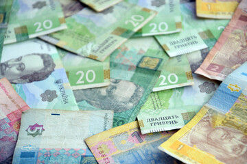 Processed collage of Ukrainian Hryvnia UAH bills banknotes texture. Background for banner