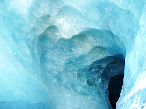 Entrance to the mysterious ice cave in Chamonix, mer de glace. Climate change