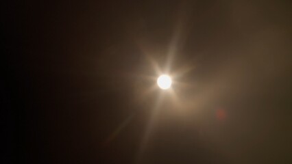 Real optical lens flare on black background