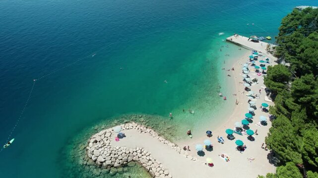 Flying Above Turquoise Waters in Croatia, Baska Voda (Ikovac Beach) 