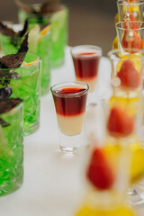 Welcome drink with cocktail glasses and drinks at an event. Alcoholic beverages at a wedding