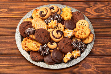 Mix of cookies . Many unhealthy snacks . Top view
