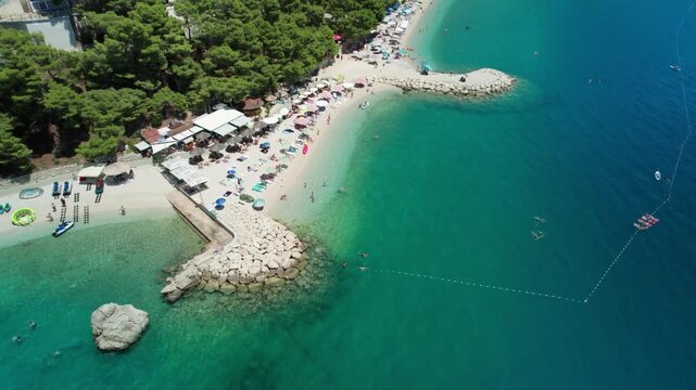 Flying Orbit around Stunning Croatian Beach, Baska Voda, Croatia (Ikovac Beach) 