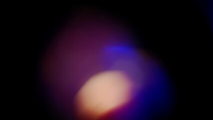 Real optical blue bokeh on black background