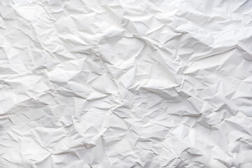 This image features a detailed close up of a crumpled piece of white paper