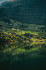 Naklejka premium Norwegian landscape at fjord and golden hour