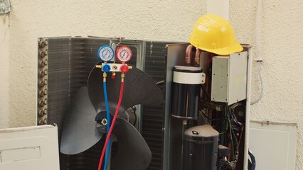 Close up zoom in shot of defective manometers used for checking HVAC system refrigerant pressure,...