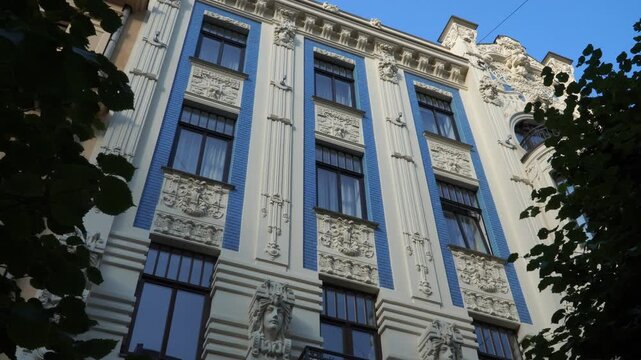 The historical facade sample of an Art Nouveau building with sculptural elements. It is located in one of the most renowned Jugendstil neighbourhoods on Alberta Street in Riga, the capital of Latvia.