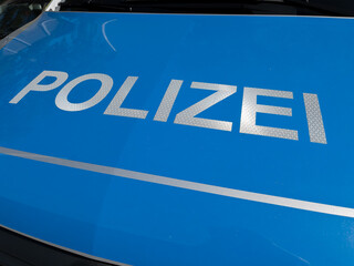 Blue Police Vehicle Hood with POLIZEI Inscription