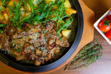Veal with mushrooms and potatoes