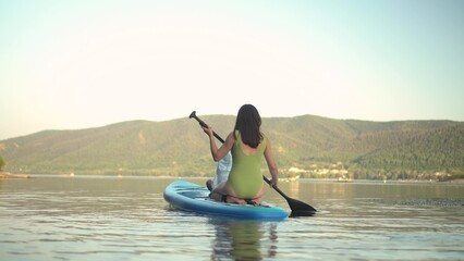 Experience a Serene and Thrilling Kayaking Adventure on a Calm and Beautiful Lake