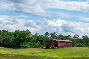 Weathered red barn landscape