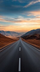 Scenic empty road stretching into the distance under a colorful sky. Ideal for travel, adventure, and nature themes.