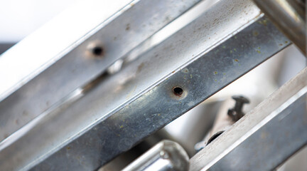 Close up of metal plate for background or texture. Selective focus.