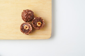 chocolate balls filled with hazelnuts, chocolate sweets in a gold wrapper