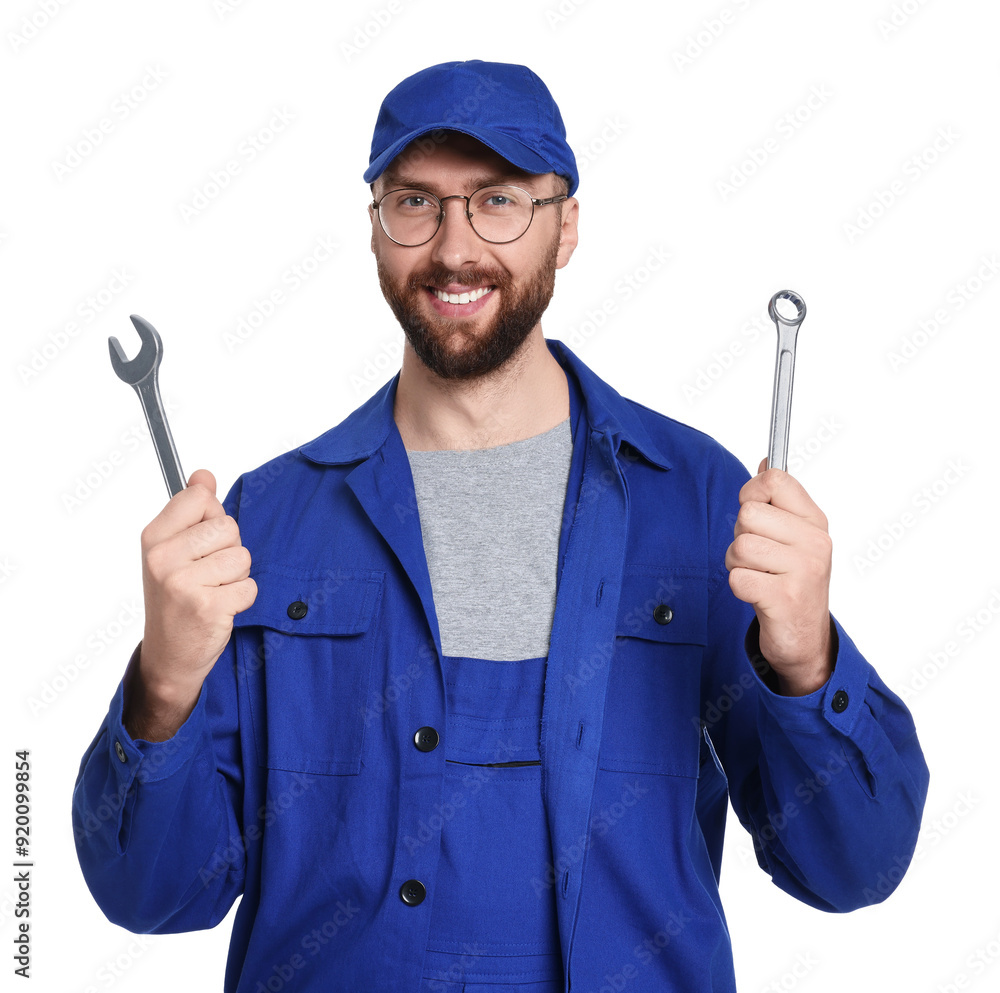 Wall mural Professional auto mechanic with tools on white background