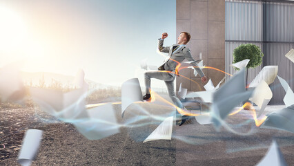 Portrait of energetic businessman jumping in open air