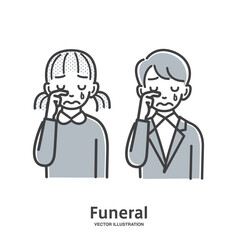 葬儀で故人を偲び悲しむ子供2人