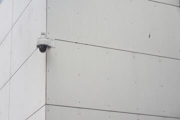 CCTV security camera operating outdoor 