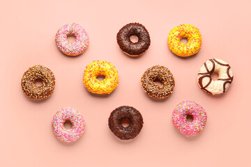 Sweet donuts on pink background