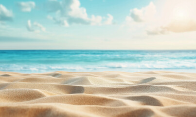 Beautiful summer background with a sandy beach and blue sky. Blurred empty space for product display, banner or design element. Summer vacation concept