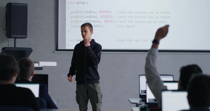 Classes Of Computer Science, Portrait Of Boy Speaking In Front Of Classmates, Future Programmers