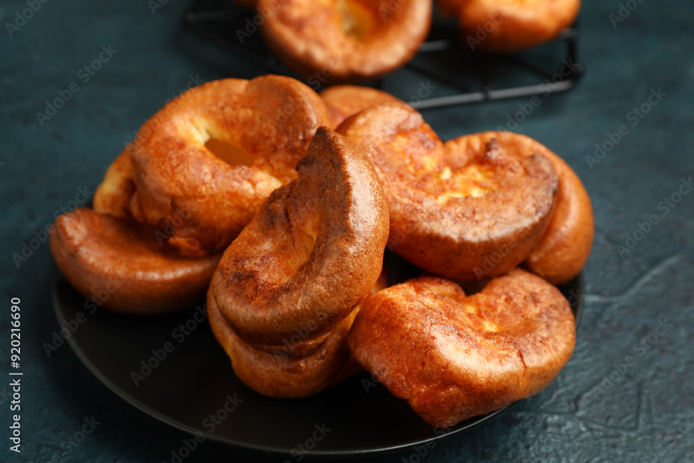 Canvas Prints Plate with tasty Yorkshire pudding on blue background