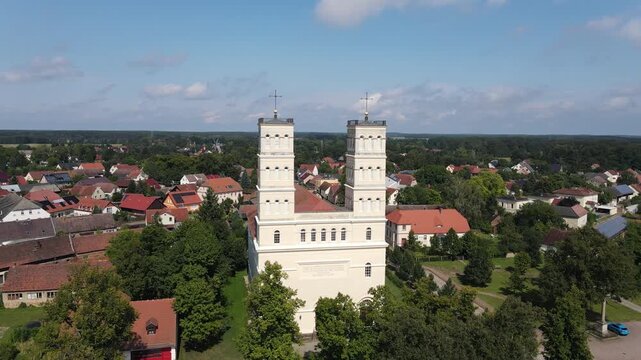 Drone shot of the village church Schinkelkirche in Straupitz, Germany.