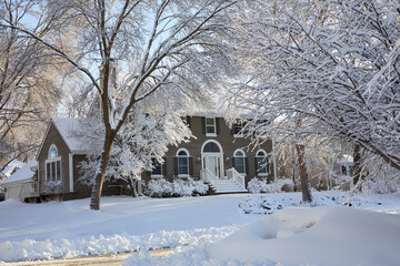 A beautiful snowfall covering my front yard and blanketing the entire neighborhood on a winter day