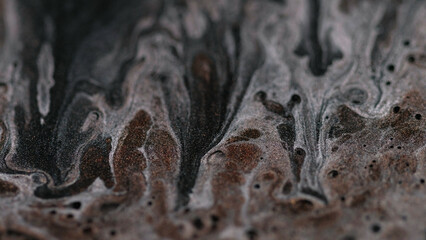 Ink paint glitter blur. Brilliant texture. Silver gel sparkling particles mixed texture creative background liquid black bubbles abstract art.