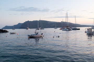 Fototapeta premium Sailboats on a calm sea in Santorini