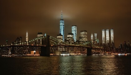 Obraz premium A night view of the Manhattan skyline from across the Hudson River 19
