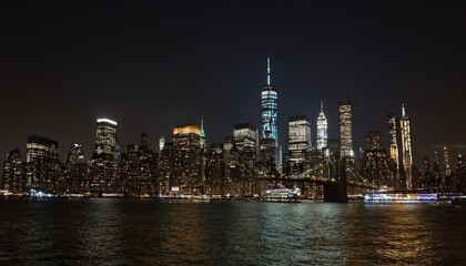 Obraz premium A night view of the Manhattan skyline from across the Hudson River 2