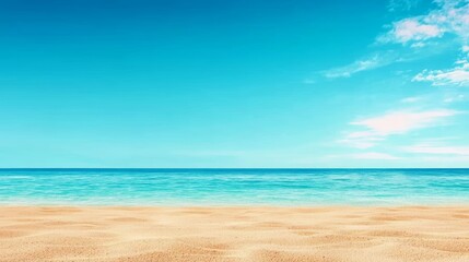 Serene beach view with golden sand and tranquil blue ocean under a clear sky, perfect for relaxation and escape.