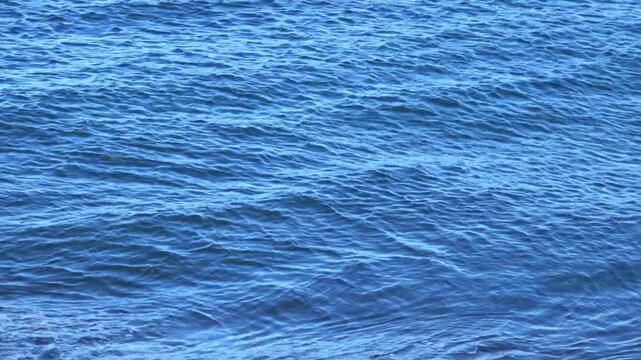 Closeup of sea waves rushing to the shore at Ise-Shima in Mie prefecture, Japan. 4K