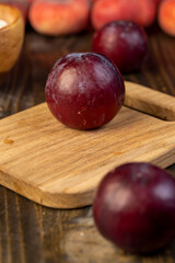 red ripe plum during cooking and slicing
