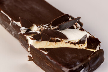 natural eco-friendly ice cream in chocolate glaze lies on a plate