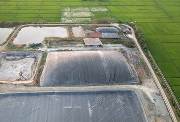 Covered lagoon digester for biogas production from poultry farm.