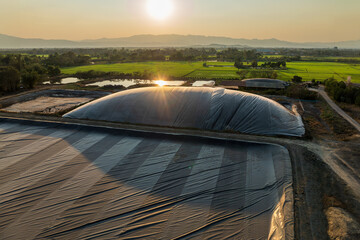 Covered lagoon digester for biogas production from poultry farm.