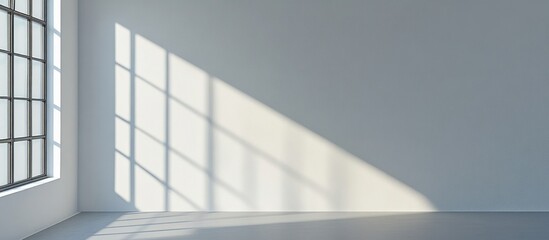 Obraz premium A Window's Shadow Cast on a White Wall and Floor