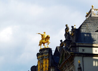 Golden Statue at the Grand Place in the Old Town of Brussels, the Capital of Belgium