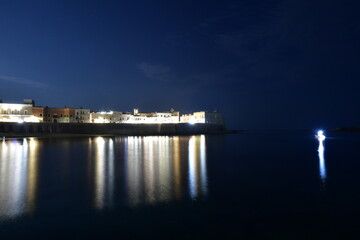Night image of Gallipoli, a seaside town in the province of Lecce, Italy.