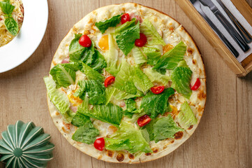 Italian pizza with cheese and vegetables