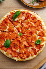 Italian pizza with cheese and vegetables