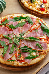 Italian pizza with cheese, sauce and ham