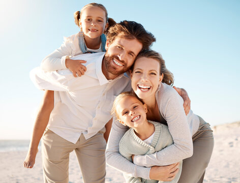 Portrait, beach and family with love, hug and happiness with kids, parents and travel for vacation. Face, seaside and mother with father, children and summer holiday with embrace, adventure and smile
