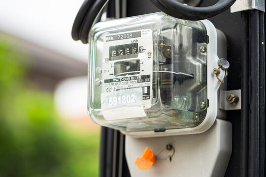 Electric measuring power meter for energy cost at home and office.
