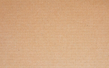 Cardboard sheet texture background, detail of recycle brown paper box pattern.
